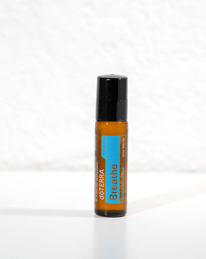 Air Touch mélange en applicateur à bille dōTERRA, roll-on sur fond blanc